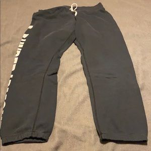 Just past the knee under armor sweat pants